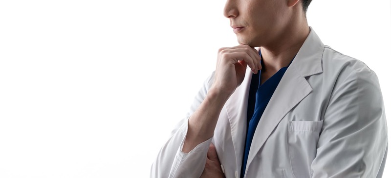 悩む医師